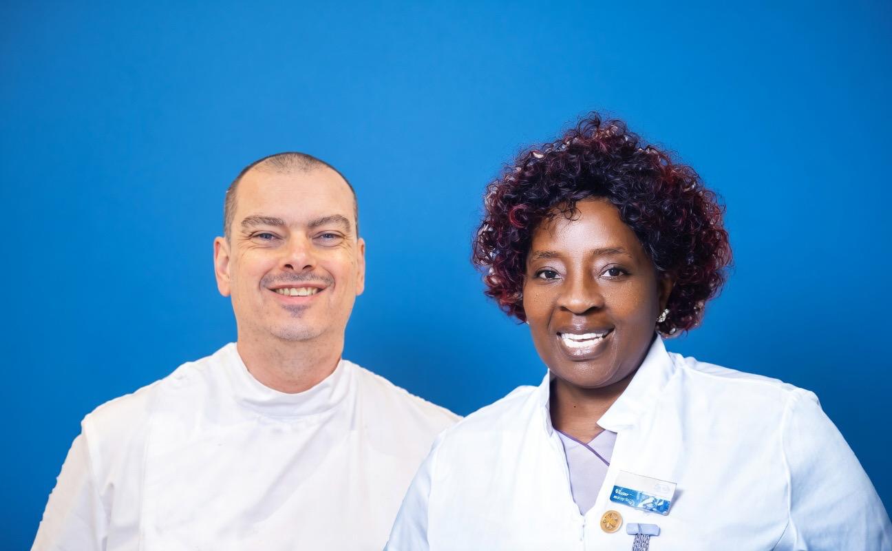 Superior Steppers — two qualified foot health practitioners in white uniforms, ready to provide mobile care across Surrey